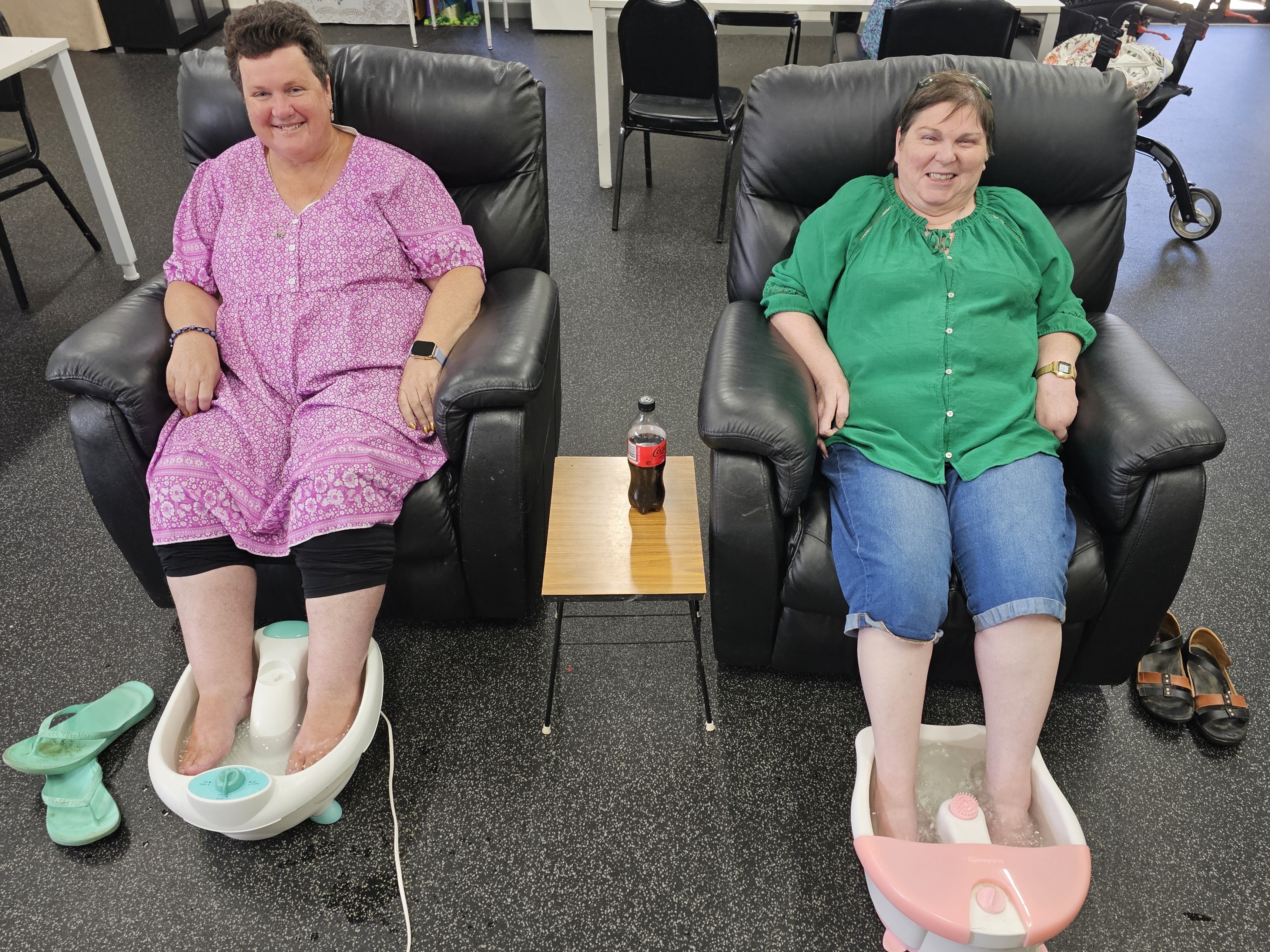 two ladies enjoying sensory foot spa at Distinctive Options Noweyung