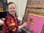 A woman paints at Group Supports Colour Gang at Distinctive Options Noweyung