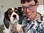 A woman smiles with a dog on her lap at Pets and pet care at Distinctive Options Noweyung