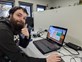 A man thumbs up showing Computer skills at Distinctive Options Noweyung