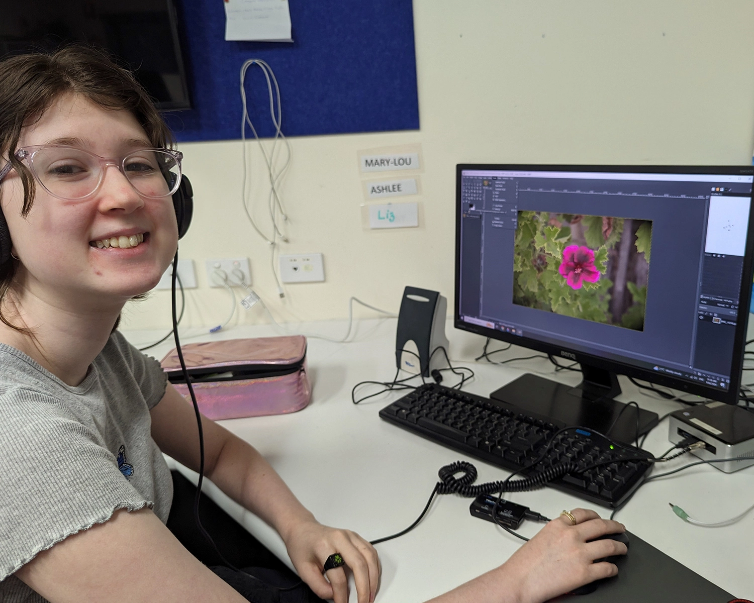 A woman shows Computer skills at Distinctive Options Noweyung