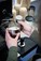 Supported Employee cafe staff serving a cappuccino at NDIS registered disability support Distinctive Options