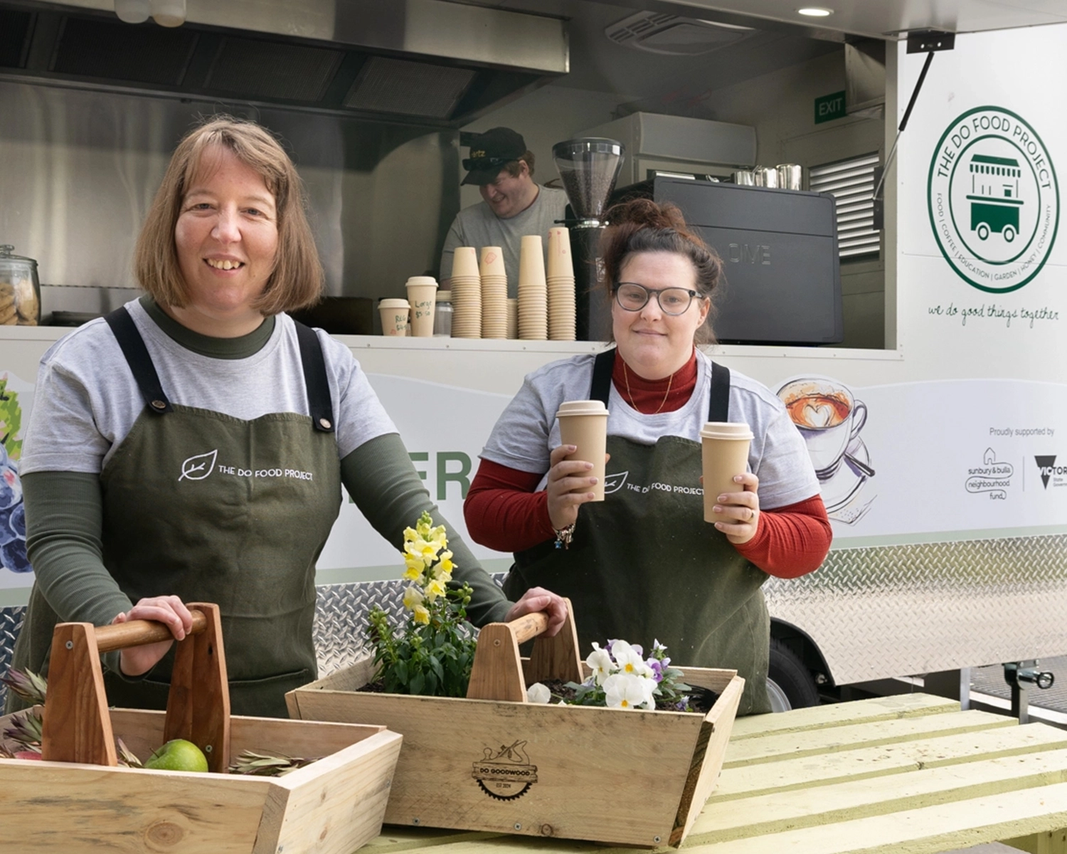 Two women work at a food truck cafe SLES Distinctive Options School leaver employment supports NDIS disability