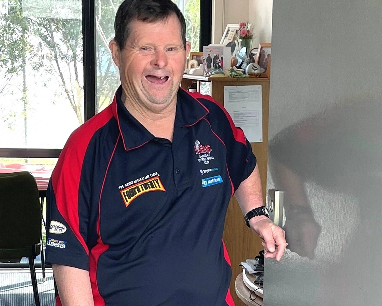 Man opening door to his supported accommodation